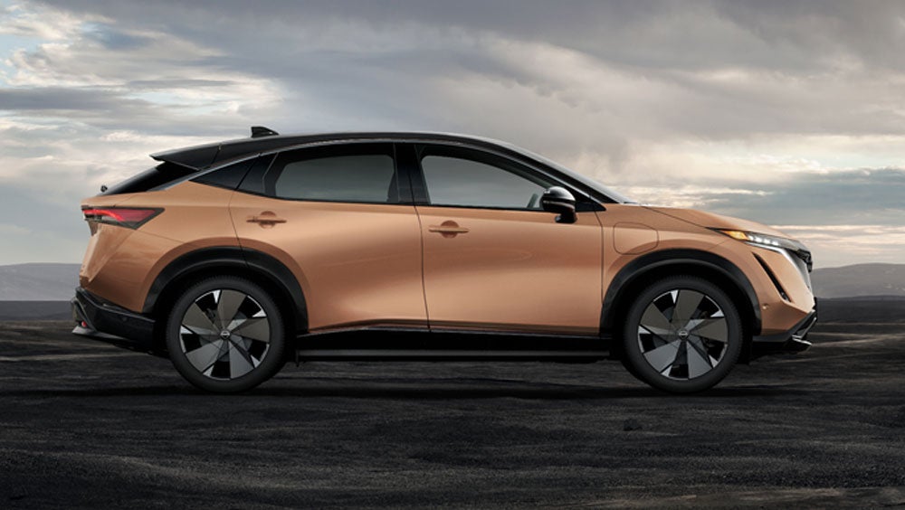 Nissan ARIYA in Sunrise Copper in dramatic landscape | Mountain View Nissan of Chattanooga in Chattanooga TN